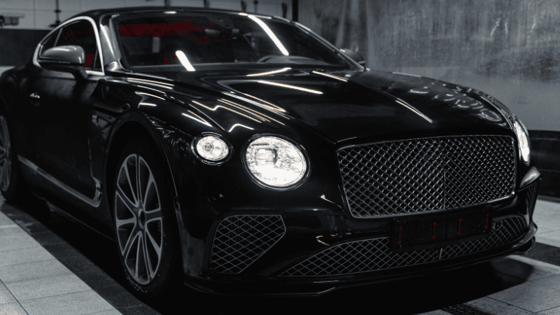 A black car wrapped with PPF