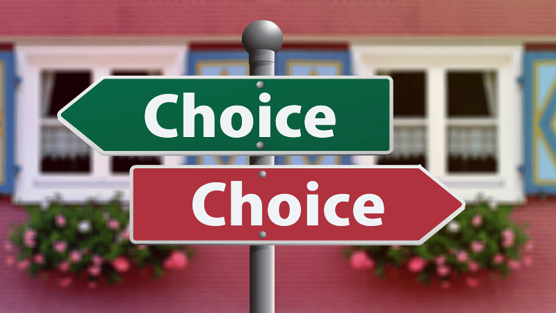 Two road signs marked "CHOICE" with opposite arrows