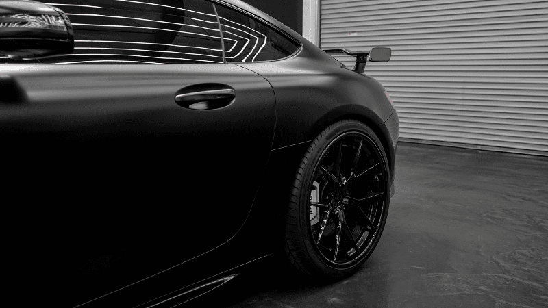 A matte black car