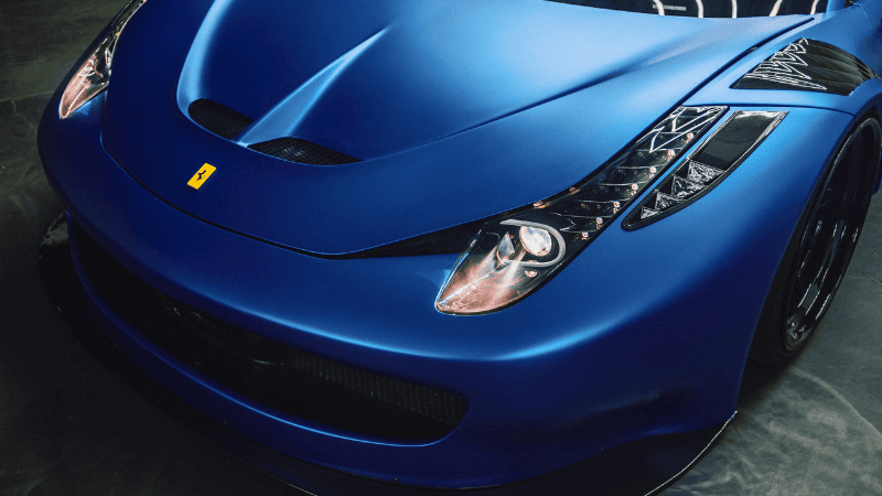 A blue sports car's hhod