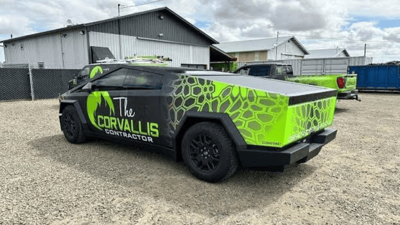 A Cybertruck with green graphics