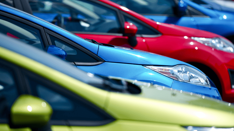 Cars in different colored car wraps