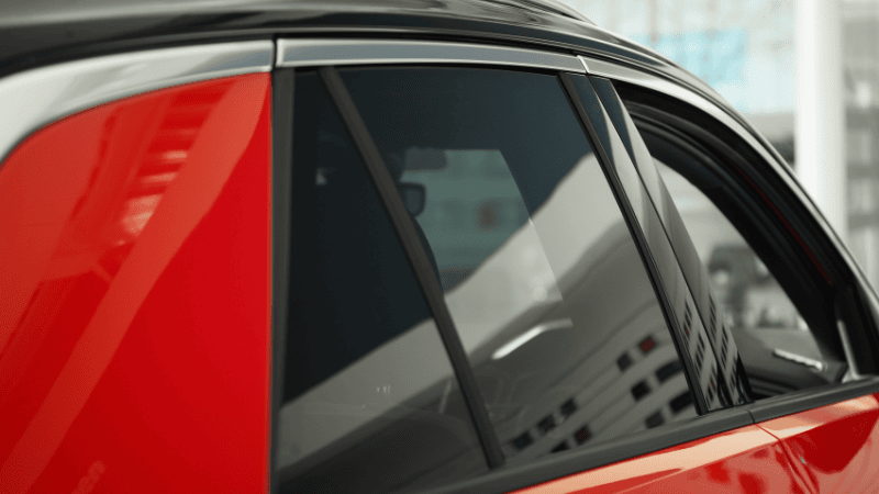 Red car with window tint films