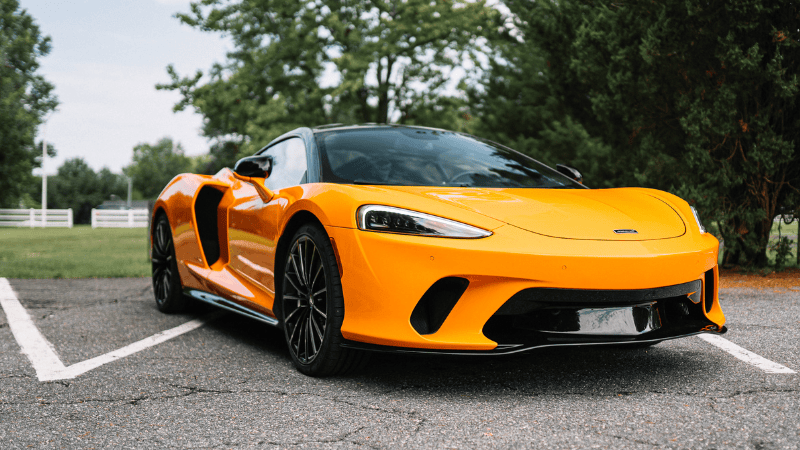 A sports car in yellow car wrap