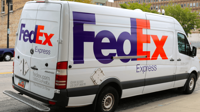 A van wrapped with advertisement car wrap