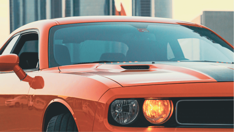 a Dodge Challenger with Racing stripes