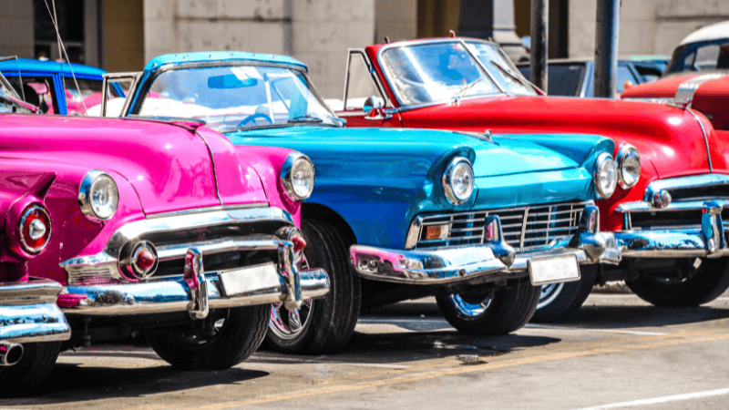 cars with different colored vinyl wraps