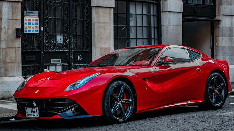 a car in red vinyl wrap