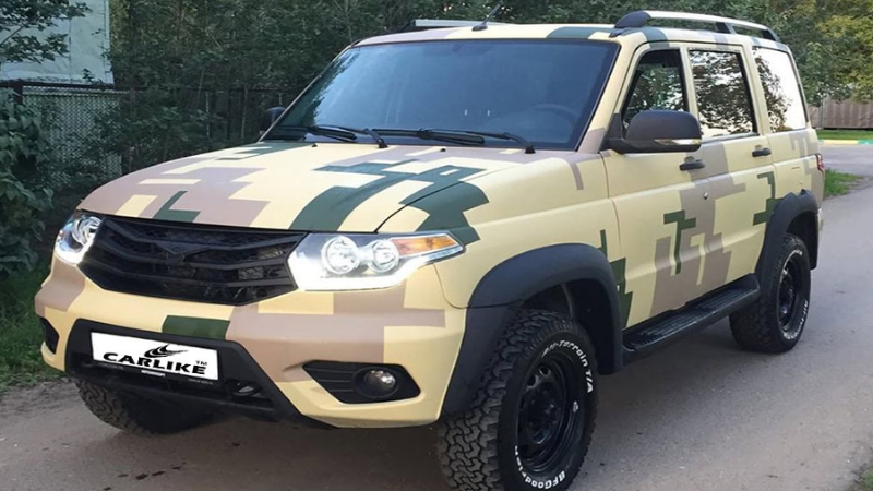 A Jeep in camo wrap